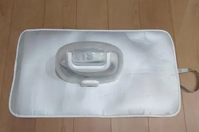 a white tray with a phone in it on a floor at LIFE TOWN Nishiarai II in Tokyo
