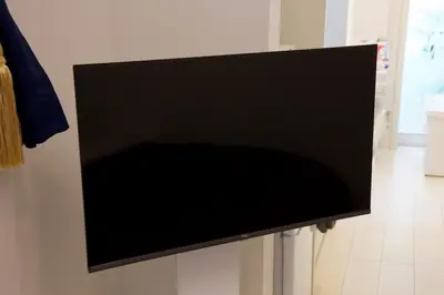 a flat screen tv hanging on a wall at 12 minutes by train to Skytree, 4 min to station on foot, 1F, 20square meter in Tokyo