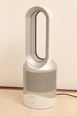 a white and gray router sitting on a floor at memento 20minutes from Haneda Airport 10minute walk from JR Kamata Station in Tokyo