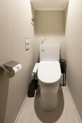 a bathroom with a white toilet in a room at FABRIC Nishi-Shinjuku in Tokyo