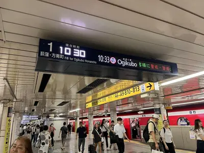 a crowd of people walking in a subway station at Shinjuku 5 min, Shin-Nakano Station 1 min walk, Room 201 in Tokyo