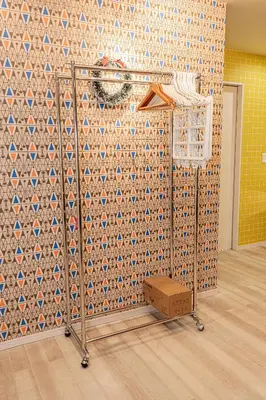 a room with a tiled wall with a box at Tokyo Skytree House 3LDK, 2Bath, 8 Guests, 6min to Keisei Hikifune in Tokyo