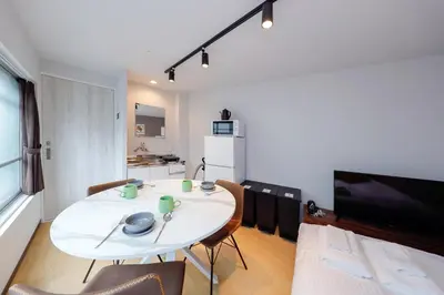 a white table and chairs in a living room at monthly TS Yoyogi in Tokyo