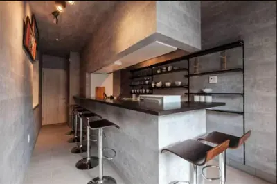 a bar with a row of stools in a kitchen at Tokyo Kiyosumi-Shirakawa Family House, 6BR, 2Bath, Sleeps 8 in Tokyo