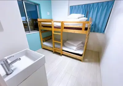 a bathroom with a bunk bed and a sink at Tokyo Kiyosumi-Shirakawa Family House, 6BR, 2Bath, Sleeps 8 in Tokyo
