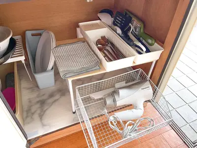 a kitchen with a sink and a mixer in a drawer at AAt Hotel \u30a2\u30fc\u30d0\u30f3\u30cf\u30a4\u30c4\u5c0f\u83c5201 in Tokyo