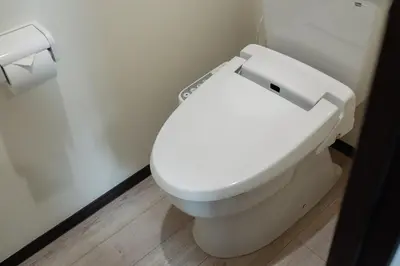 a bathroom with a white toilet in a room at Tokyo Skytree 102 Bali-Style Double bed Bath & WC in Tokyo