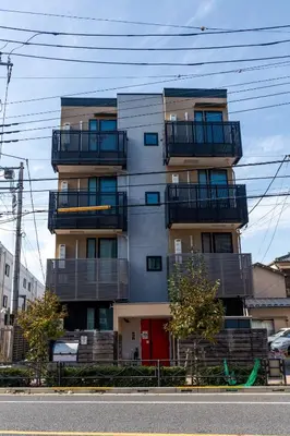 a tall building with balconies on the side of it at Tokyo Skytree 201 Elegance Blue Twin Room with Bath and WC in Tokyo