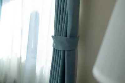 a curtain that is taped to a window at Tokyo Skytree 301 Elegance Blue Twin Room bath WC in Tokyo
