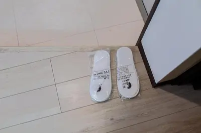 a pair of shoes on the floor in a bathroom at Tokyo Skytree 202 Bali-style Double Room Bathtub Private Bathroom 2 minutes to subway in Tokyo
