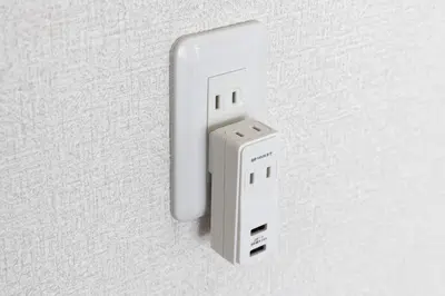 a white electrical outlet on a white wall at Shibuya Crossing 5mins walk COZY BRIGHT COMFY PAD 35sqm in Tokyo