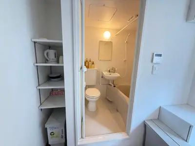 a small bathroom with a toilet and a sink at Naomi\u4e2d\u91ce\u5742\u4e0a\u65b0\u5bbf-NN0126 in Tokyo