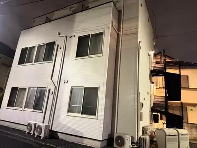 a white building with windows on the side of it at Naomi\u4e2d\u91ce\u5742\u4e0a\u65b0\u5bbf-NN0126 in Tokyo
