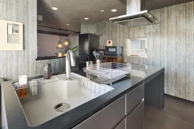 a kitchen with a sink and a counter top at \u30de\u30a4\u30b0\u30ec\u5357\u9752\u5c71 in Tokyo