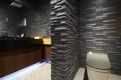 a bathroom with a sink and a toilet in a room at \u30de\u30a4\u30b0\u30ec\u5357\u9752\u5c71 in Tokyo