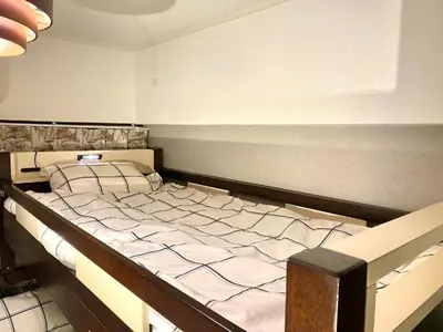 a bedroom with a large bed in a room at The Hope Ikebukuro in Tokyo