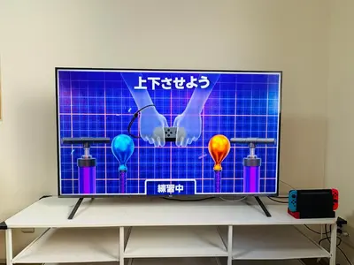a flat screen tv sitting on top of a table at Elle Maison\u5927\u68ee 102 in Tokyo