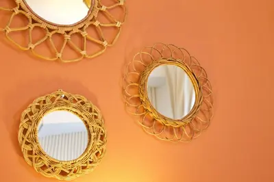 two gold mirrors on a wall with a orange wall at \u30aa\u30fc\u30d6\u30ea\u30aa\u30f3\u6075\u6bd4\u5bff202 in Tokyo