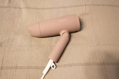 a wii remote sitting on top of a table at studio aoi 302 in Tokyo