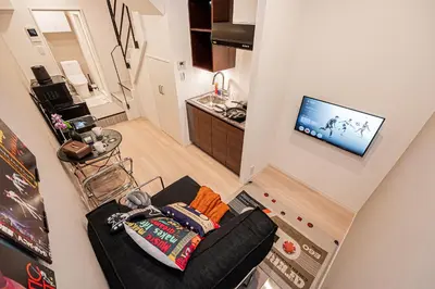 an overhead view of a living room with a couch at Mi-HOTEL SHIMOKITAZAWA in Tokyo