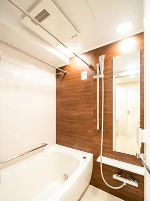 a bathroom with a white tub and a shower at Section L Residence Moto-Azabu in Tokyo