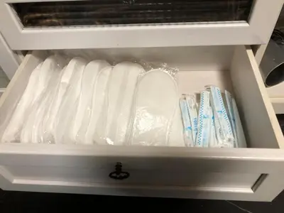 a drawer in a refrigerator with toothbrushes at OZ sumida in Tokyo