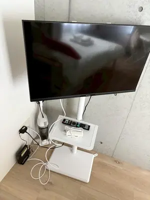 a computer monitor sitting on top of a table at Pure Rest Otsuka 302 JR Otsuka Station in Tokyo