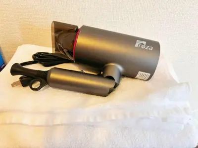 a flashlight sitting on top of a table at \u30a2\u30eb\u30b9\u30db\u30fc\u30e0 \u6c60\u888b in Tokyo
