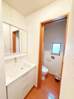 a bathroom with a white sink and a toilet at Ueno&Asakusa Stay Whole House for 11, Great Access in Tokyo