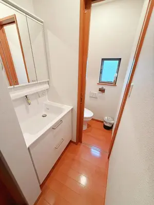 a bathroom with a white sink and a toilet at Ueno&Asakusa Stay Whole House for 11, Great Access in Tokyo