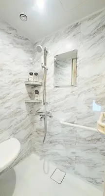 a bathroom with a shower and a toilet at Ueno&Asakusa Stay Whole House for 11, Great Access in Tokyo