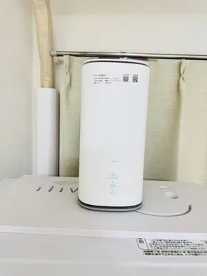a white appliance sitting on top of a washing machine at Shinagawa City \u834f\u539f101-SN0479 in Tokyo