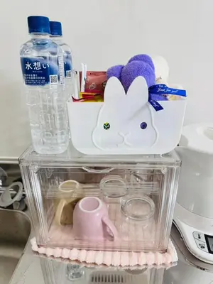 a clear container with a bottle of water and other items at Shinagawa City \u834f\u539f101-SN0479 in Tokyo