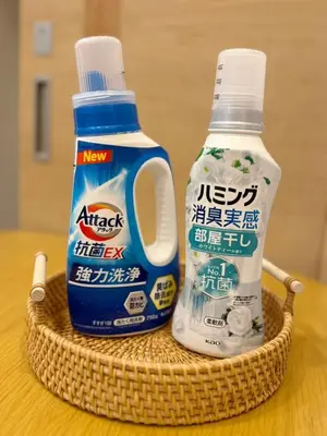a basket with two bottles of laundry detergent and bleach at Silvership Hotel 201 in Tokyo
