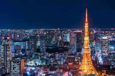 a view of the eiffel tower at night at \u30aa\u30fc\u30d6\u30ea\u30aa\u30f3\u6075\u6bd4\u5bff201 in Tokyo