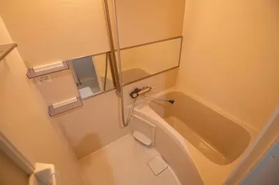 a bathroom with a shower and a bath tub at Green Apple Otsuka 201 in JR Otsuka station in Tokyo