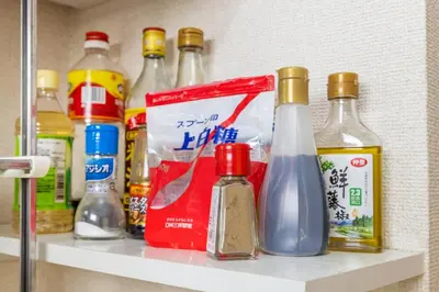 a shelf with a bunch of bottles on it at 7 min to JR Otsuka,Direct Yamanote Line ,1 stop to Ikebukuro,Direct to Shinjuku ,Shibuya,Fully Renovated,18 sqm,2 Guests #101 in Tokyo