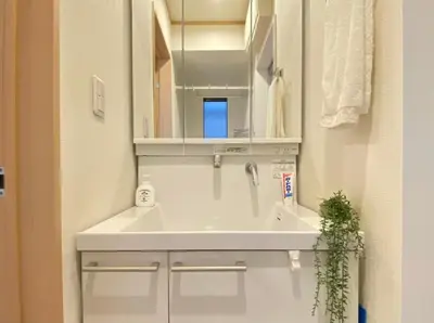 a bathroom with a sink and a mirror at SK - Tokyo Ikebukuro Premium Comfort 4LDK Entire house in Tokyo