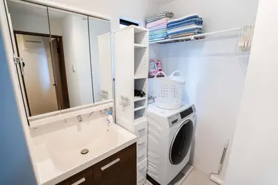 a bathroom with a washing machine and a sink at New 2025, whole house, 2min Ikebukuro, 5min Shinjuku, 6pax in Tokyo