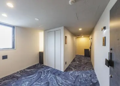 an empty room with a hallway with a door at ROLES Ryusen 902 near Asakusa,Ueno,Skytree in Tokyo