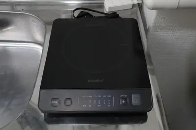 a small electronic device sitting on a shelf at Shinbashi Oliver in Tokyo