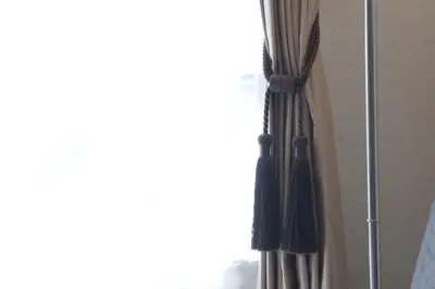 a curtain in a room with a window at #3 Tokyo Shinjuku Shibuya room in Tokyo