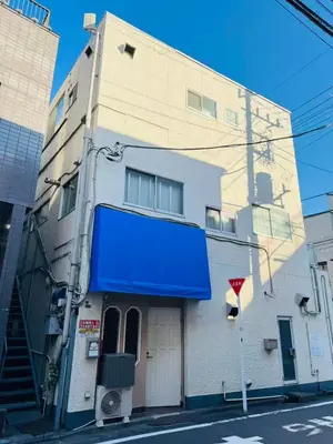 a building with a blue awning on the side of it at Shinagawa City \u834f\u539f201-SN0480 in Tokyo