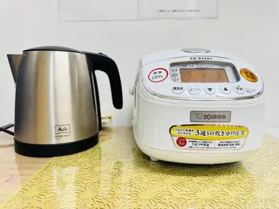 a toaster sitting on top of a counter next to at Shinagawa City \u834f\u539f201-SN0480 in Tokyo