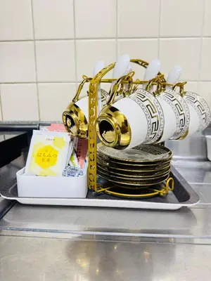 a stack of plates on a tray in a kitchen at Shinagawa City \u834f\u539f301-SN0481 in Tokyo