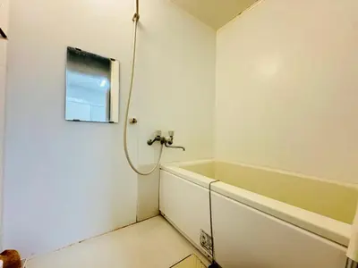 a bathroom with a bath tub and a sink at Shinagawa City \u834f\u539f301-SN0481 in Tokyo