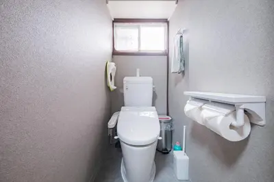 a small bathroom with a toilet and a sink at JJ HOUSE Omori Heiwajima - Near Shinagawa Haneda Airport - Japanese Style Room - Floor Heating System in Tokyo