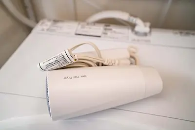 a white bag sitting on top of a counter at 202Room, 5 mins walk from JR Kinshicho North Exit!Near Asakusa & Sky Tree!! The house is on the 2th floor with an elevator, convenient transportation There is a balcony and the room is soundproofed in Tokyo