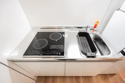 a table with a dj equipment on top of it at \u897f\u6b66\u65b0\u5bbf\u7dda\u5f92\u6b69\u4e09\u5206 ZAITO Shimoochiai Stay in Tokyo
