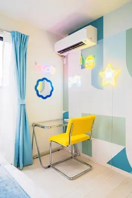 a yellow chair in a childrens room with stars and a wall at nishiotiai,shinjukustation12 minutes by train in Tokyo